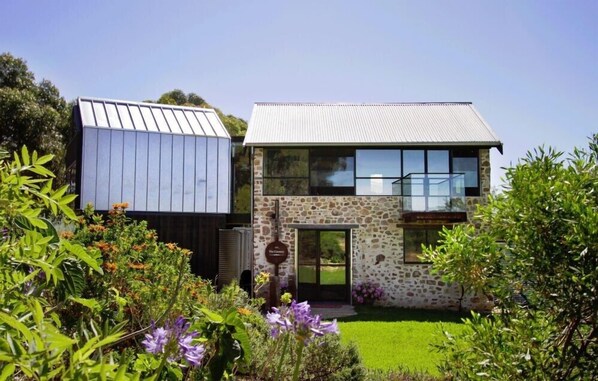 "The Granary" set amongst gorgeous private gardens