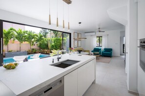 Kitchen opening to backyard for that perfect indoor-outdoor feel