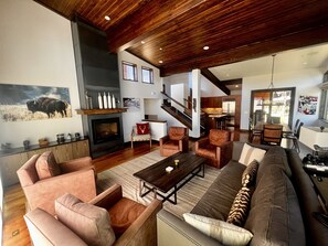 Spacious living room with attached kitchen and dining room.