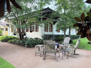 Fire pit in center of 3 chairs