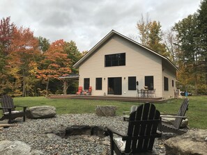 Large, stone fire pit with unlimited firewood.  Open deck for afternoon sun.