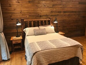 Master bedroom Queen bed 
one set of bunk beds