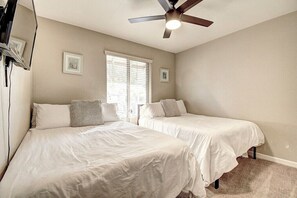 3rd Bedroom has 2 comfy double beds-TV