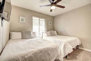3rd Bedroom has 2 comfy double beds-TV