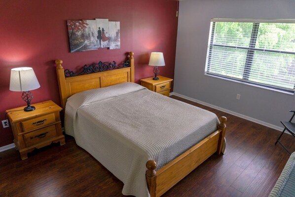 Bedroom with a Queen size bed and flat screen TV