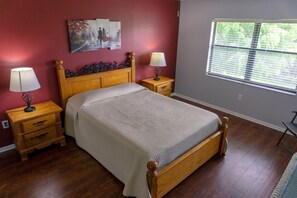 Bedroom with a Queen size bed and flat screen TV