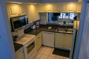 Fully equipped kitchen with fridge, stove, oven, microwave. All utensils, glasses and plates are provided