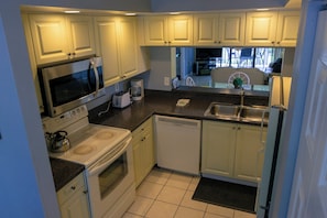 Fully equipped kitchen with fridge, stove, oven, microwave. All utensils, glasses and plates are provided