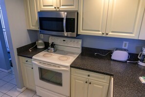 Fully equipped kitchen with fridge, stove, oven, microwave. All utensils, glasses and plates are provided