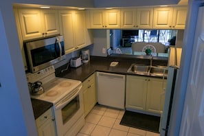 Fully equipped kitchen with fridge, stove, oven, microwave. All utensils, glasses and plates are provided