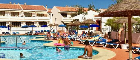 Heated pool and free sunbeds around main pool
