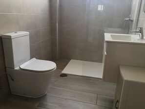  New modern fully tiled bathroom with walk in shower.