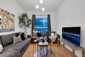 Living Room: Features 2 sofa beds and a Smart HD TV. Log in to your favorite streaming services like Netflix, Disney+, and Prime.