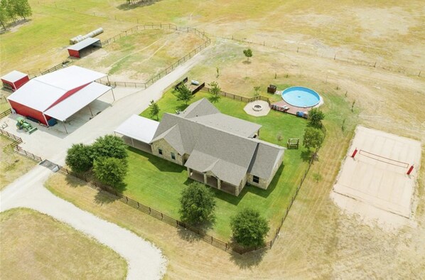 Enjoy the farm nestled on 13 acres of beautiful, rural property.