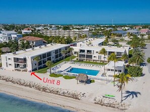 Unit 8 is the corner unit directly on the beach with beach and pool views.