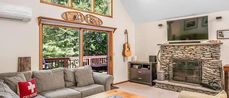 Our signature fieldstone fireplace in our huge great room.