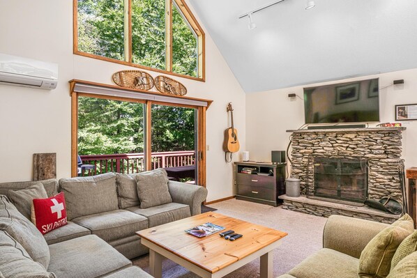 Our signature fieldstone fireplace in our huge great room.