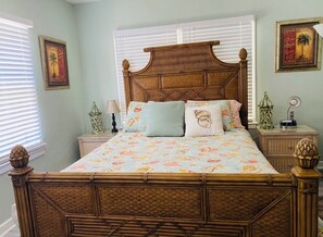 Bedroom 1 with Queen Bed, TV, dresser, closet, desk/chair