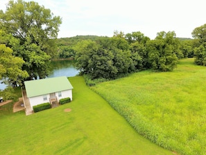 Green roof is out, but this aerial shows how close house is to river