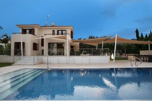 The outstanding villa Leonidas with the large pool and sunset!