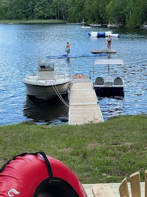 30 foot dock room for 23 foot guest boat.  Paddle boat included in water toys