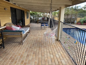 Massive underroof patio, huge day bed, swing chair, outdoor dining setting, BBQ