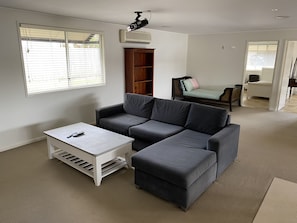 One of three sitting areas in the massive one level living space