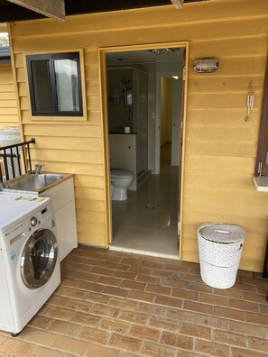 bathroom flows through to outdoor laundry and hanging area