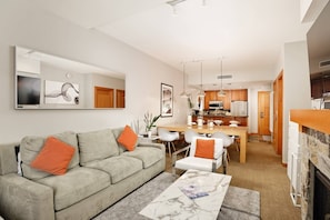 Warm tones and inviting furnishings create a welcoming space for you to spend time with your friends or family.
