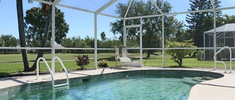 SB21547 - Screened in pool area with fairway view