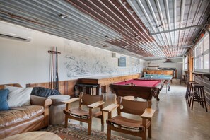 Party Barn- Game Area with sleeper sofa for a late night of movies and cozy time