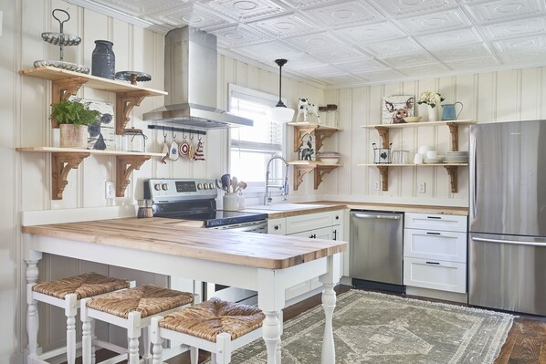 New kitchen - fully equipped for cooking.