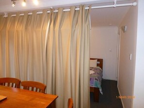 Bedroom 3 features blackout curtains.