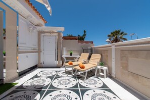 Sun loungers on terrace