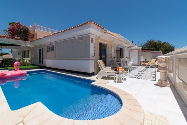 View of villa and private heated pool