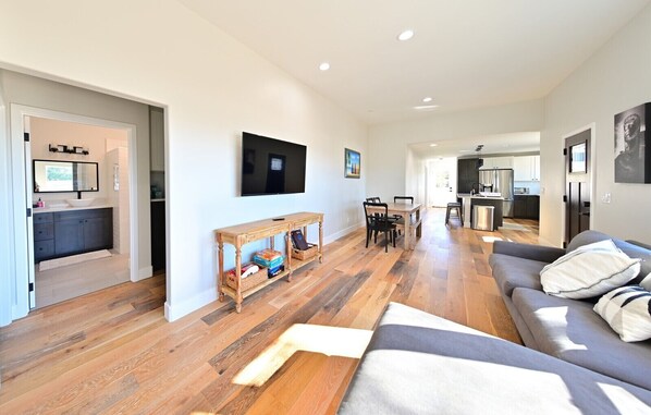 Massive and luminous open concept kitchen living room, offering a great stay