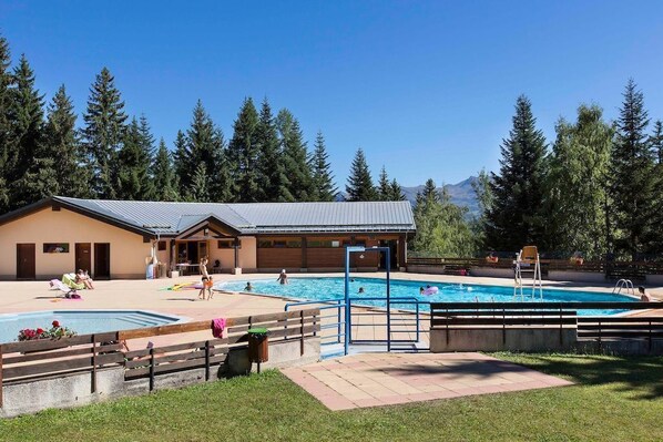 Relax by the shared municipal pool.