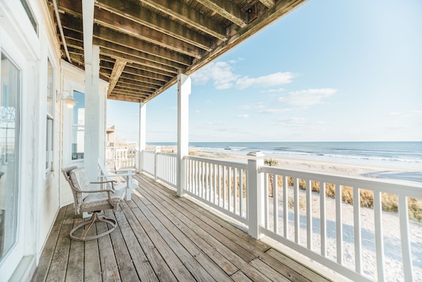 Enjoy the views on this balcony, with stair access to the sand.