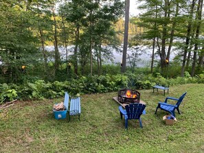 Fire pit with unlimited wood to enjoy and create memories.