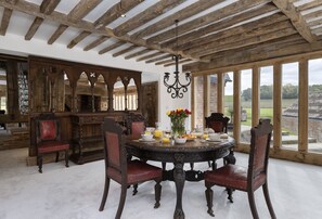 Ground floor: The elegant dining room with antique furnishings