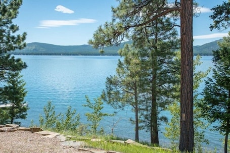 Enjoy your own private lakefront shoreline with views from home and deck!