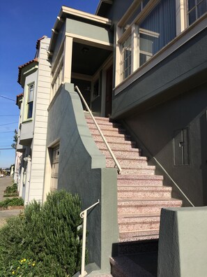 one flight of stairs leading to entrance