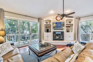 Top-Level Living Room with Deck Access
