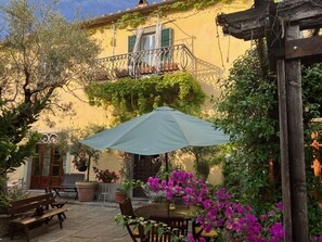 Plant, Building, Property, Botany, Flower, Shade, Lighting, Architecture, Outdoor Table, House
