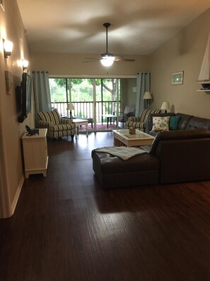 New flooring throughout great room, entry and dining room.