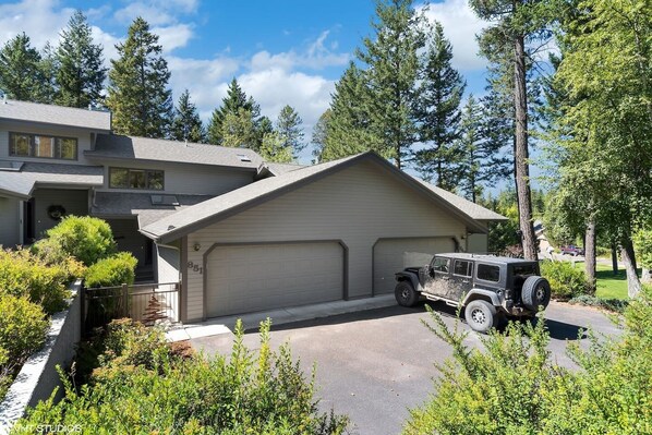 Welcome to my home.  My garage is to the left of my neighbor's Jeep.