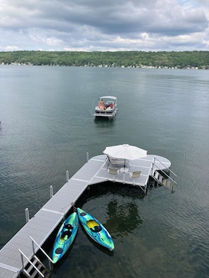 Phenomenal dock!   Tie your boat!  Steps into lake!   Roomy!  2 attached chairs.