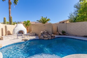 Heated pool w large gas firepit and waterfall feature