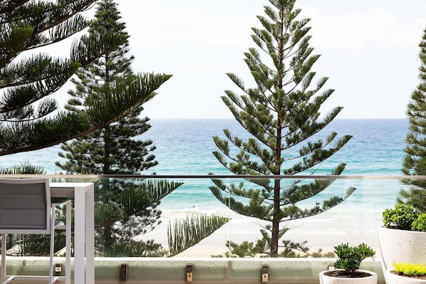 Bar table overlooking the surfers and beach front action