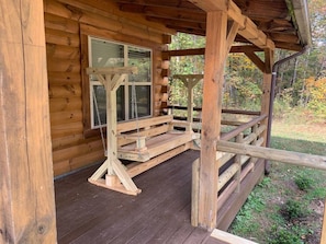 Swing out! Sit a spell and watch nature from the front porch.